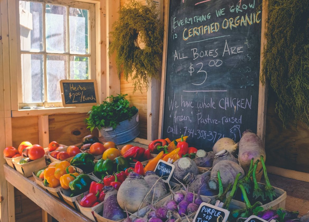 variety of vegetables display with Certified Organic signage